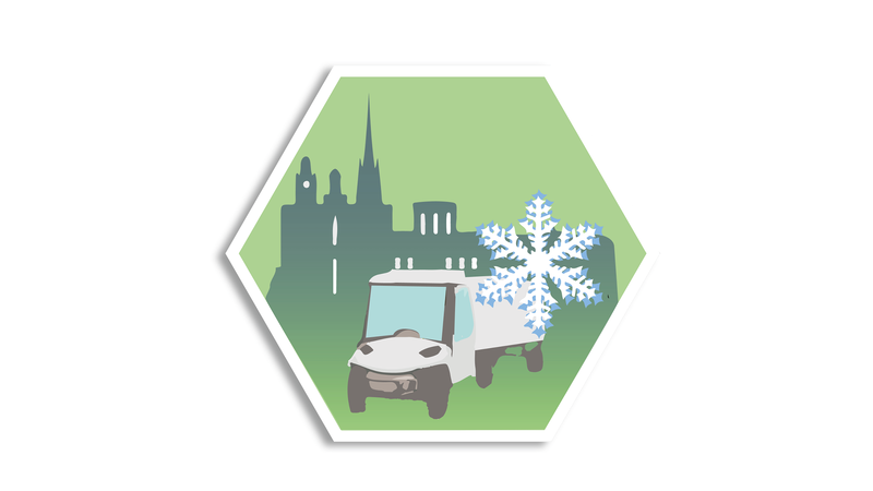 Ikon som visar en fossilfri godstransport, liknar en golfbil med en illustrerad stadssiluett i bakgrunden